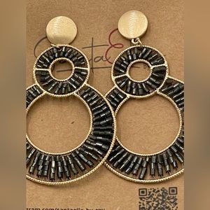 Santaellabyrey double hoop earrings made with black beads.